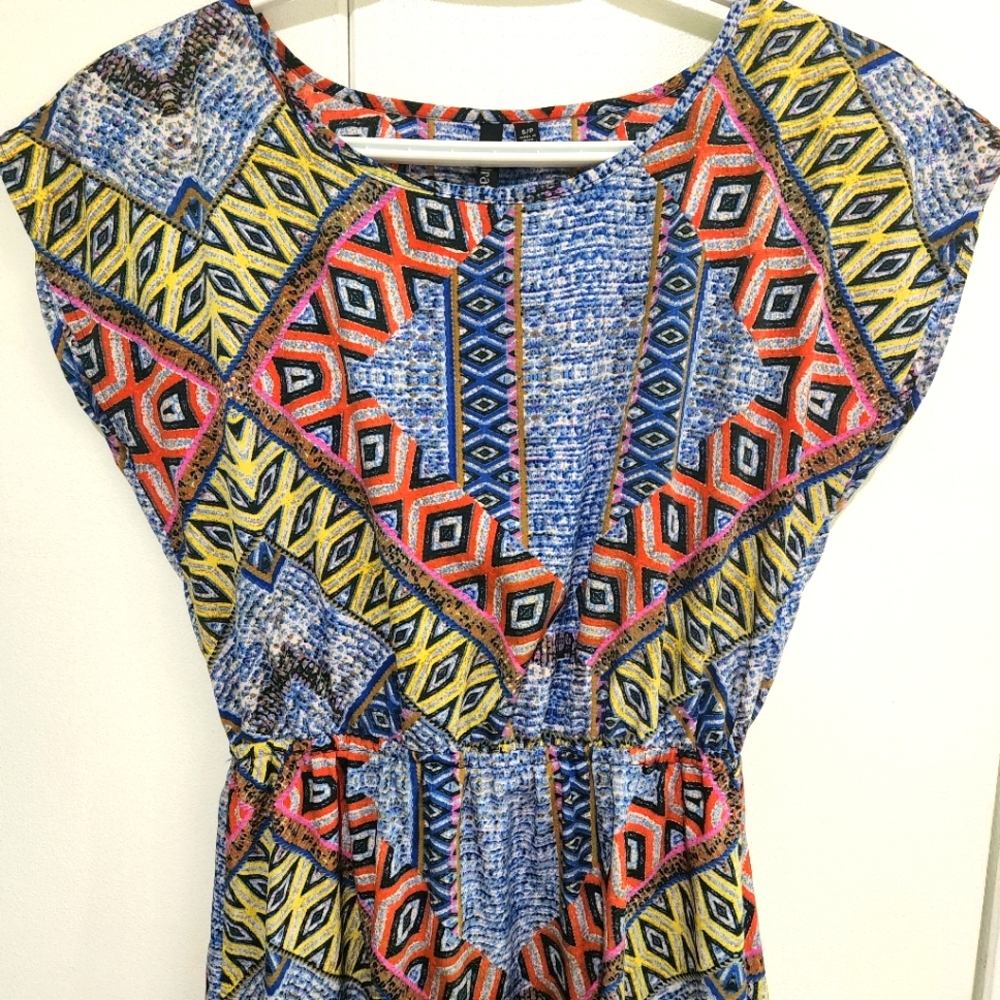 Light weight funky summer dress. Never worn.